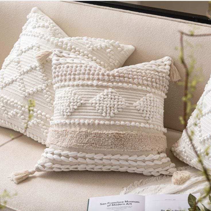 cream colored textured throw pillows bohemian bedroom decor ideas