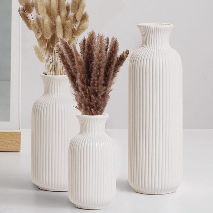 white ceramic vases